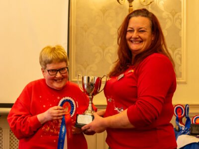 Liz Brown presenting Terri Morris with the Points Winner Trophy